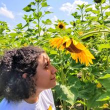 Maria Requena and a sunflower