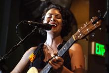 Heather Aubrey Lloyd playing guitar