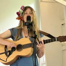 Claire Dacey and her guitar