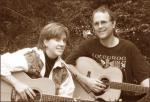 photo of Peter and Annie with their guitars