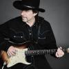 Roger Street Friedman playing electric guitar